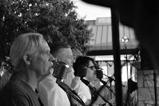 Live Music by Three on the Tree and pork chop dinner