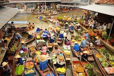 Damnoen Saduak Floating Market and Erawan Waterfall: Explore Thailand's Cultural Richness