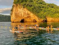 Immerse in the water element with Standup paddle board yoga