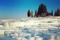 Pamukkale Daily Guided Tour: Experience Travertines, Hierapolis, and Karahayit Red Springs