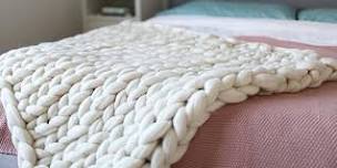 Chunky arm knitted blanket