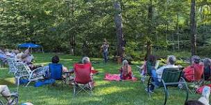 Singer/Songwriter Charlie Chronopoulos outdoors at the Inn with food and beverages!